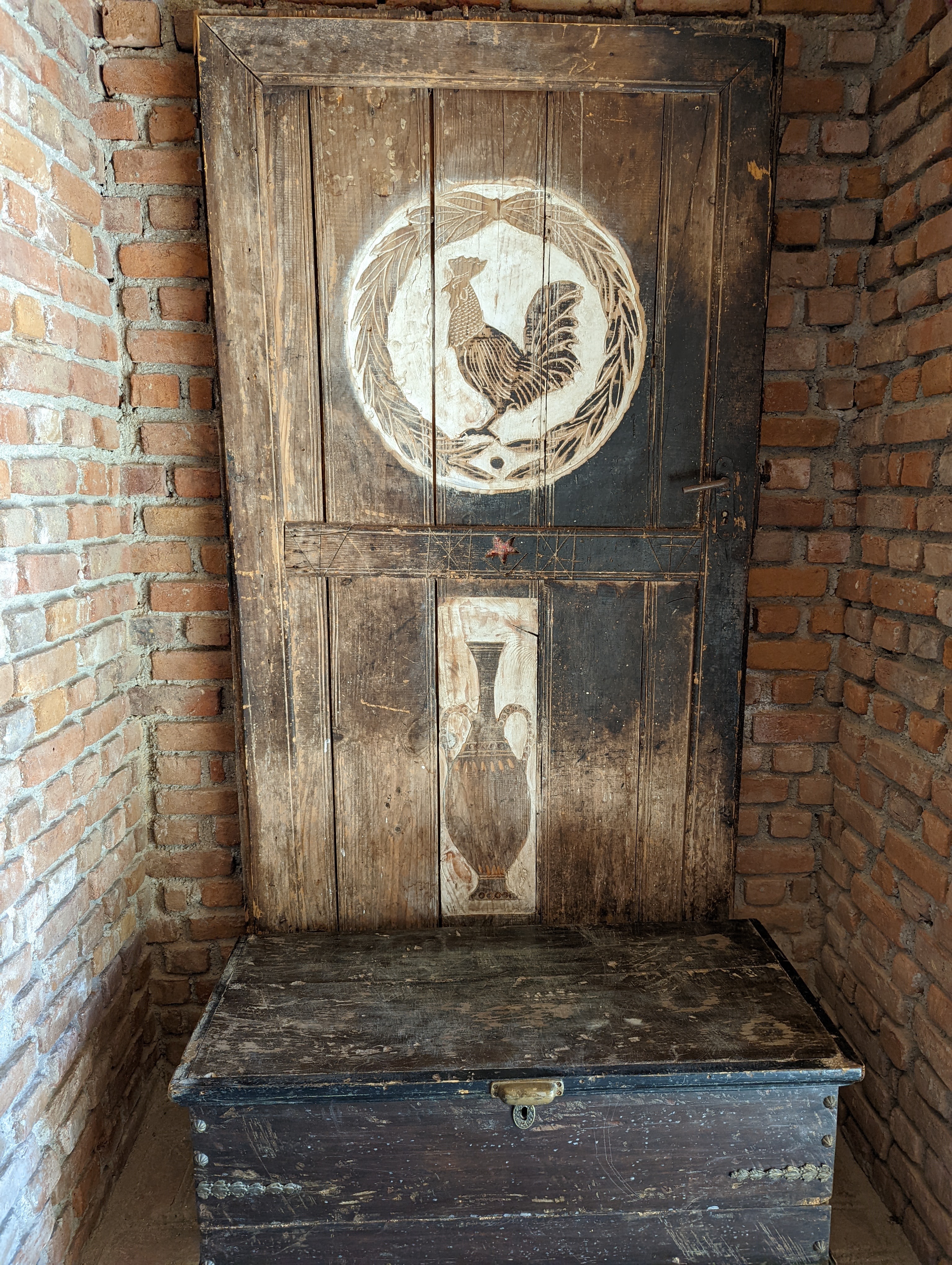 Door and chest repurposed into a bench