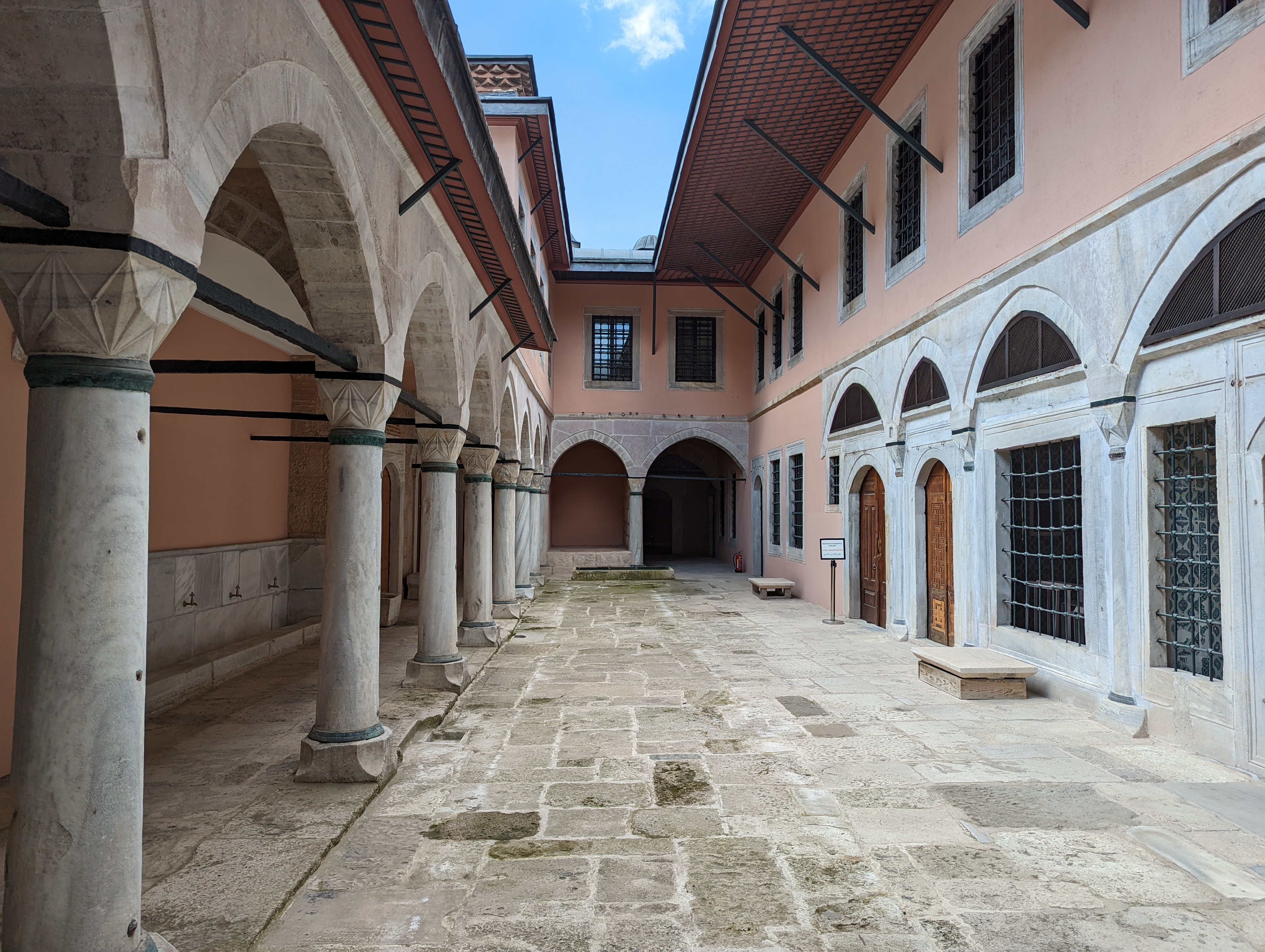 The Courtyard of the Concubines and the Sultan's Consorts (Cariyeler ve Kadınefendiler Taşlığı), located deep within the Harem section of Topkapı Palace.  It is the smallest courtyard in the entire palace complex, surrounded by residential suites, dormitories, baths, and laundry facilities.