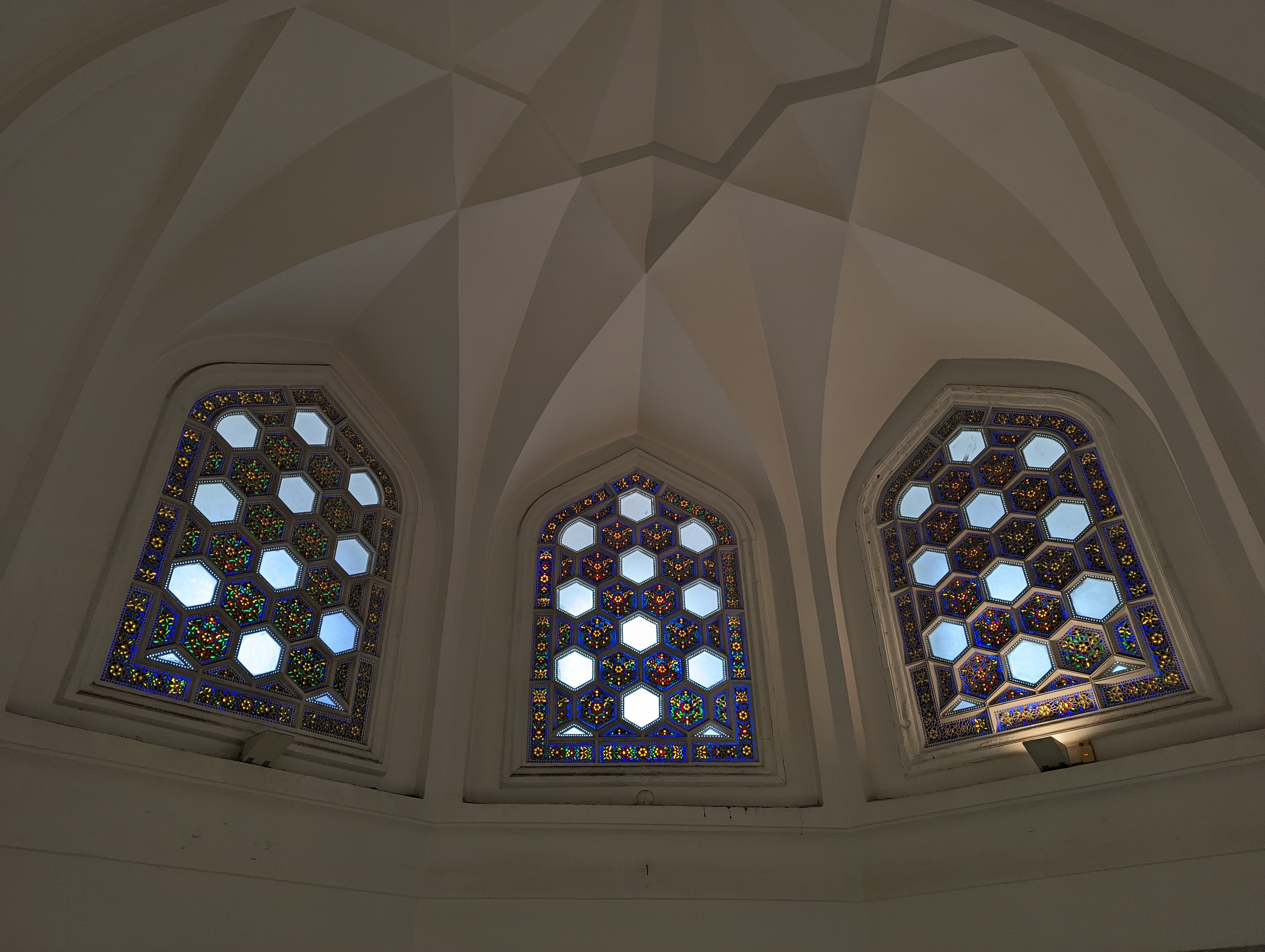 Vaulted ceiling and stained glass upper windows (tepe pencereleri)