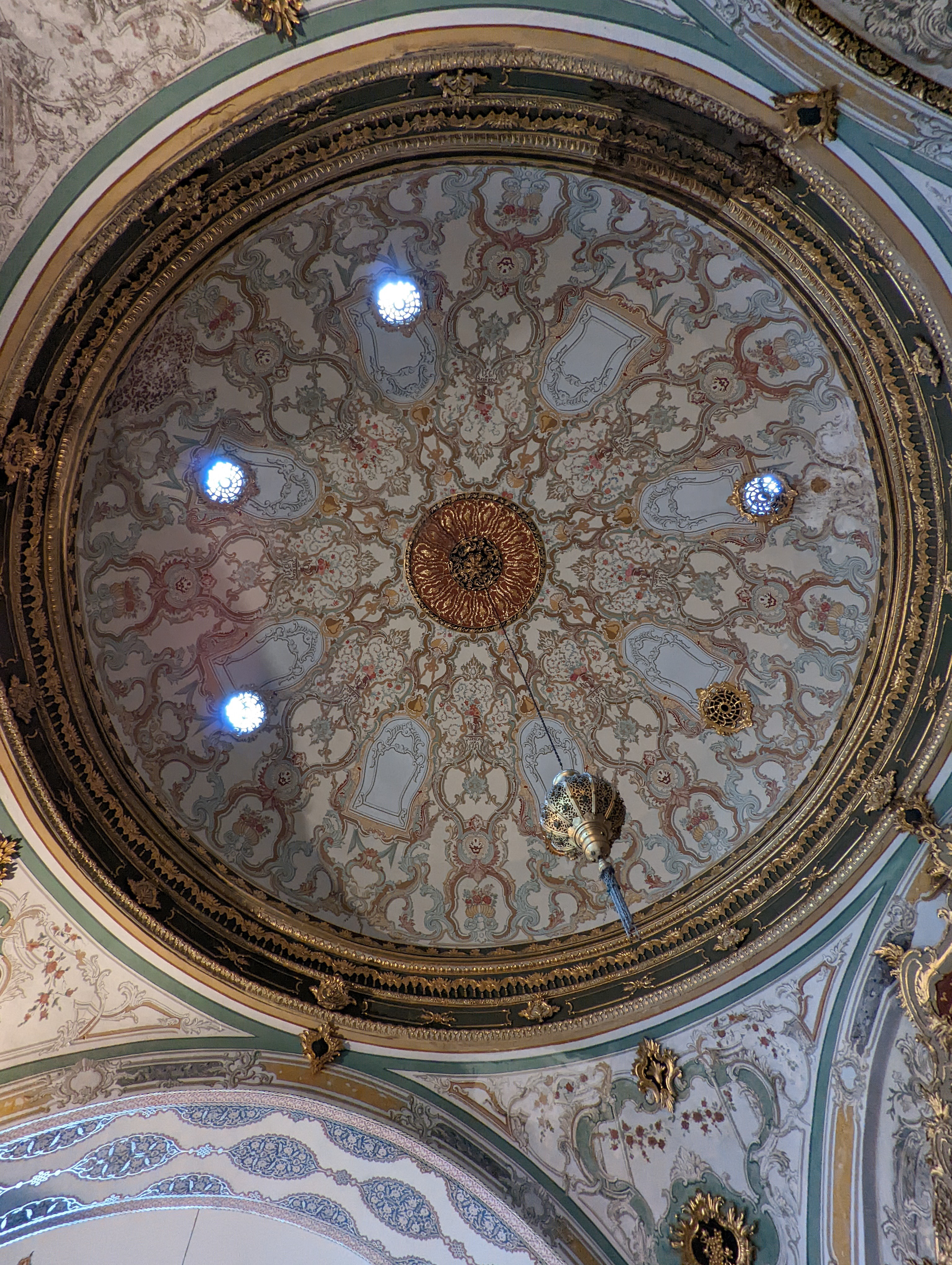 This is a view looking directly up into the dome of the Secretarial Office (Divan Kalemi)—the second chamber of the Imperial Council (Divan-ı Hümayun) in the Second Courtyard.