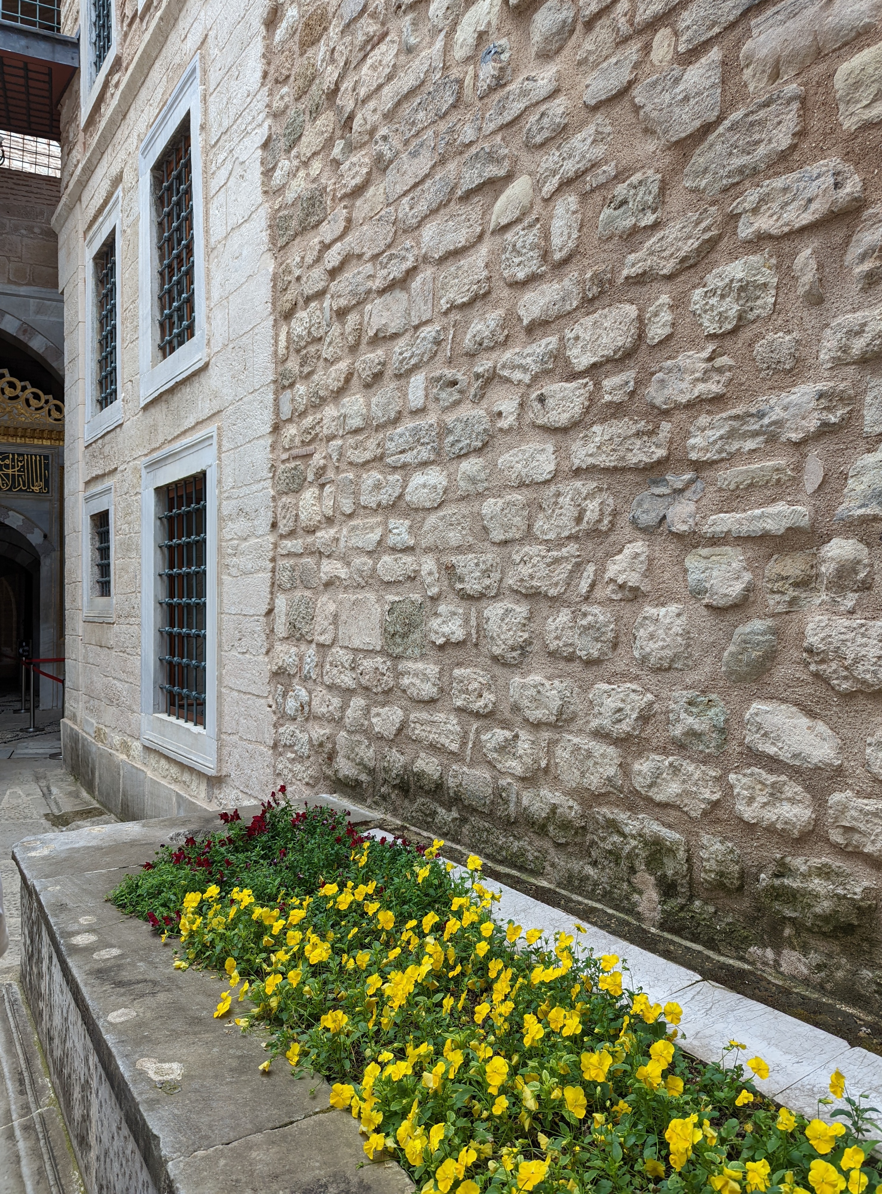 This is the Courtyard of the Black Eunuchs (Harem Ağaları Taşlığı), which serves as the primary entrance corridor into the Imperial Harem.