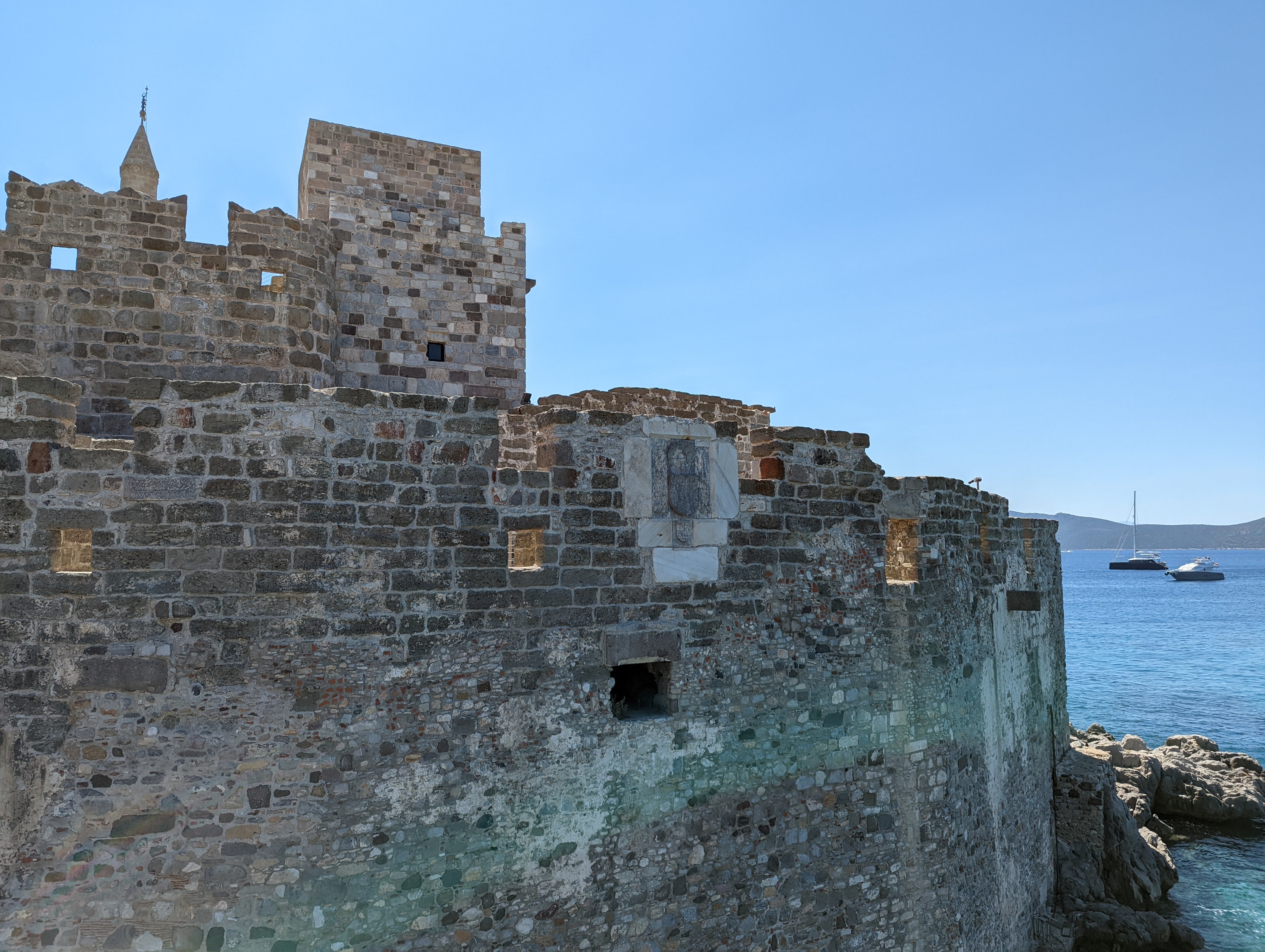 Castle walls rising from the sea