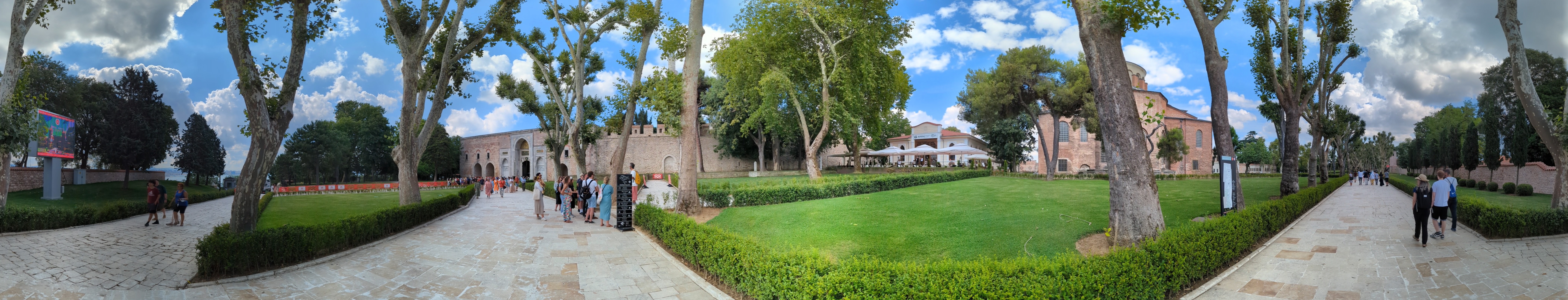 This panoramic photo captures the expansive First Courtyard (Alay Meydanı or Court of the Janissaries) of Topkapı Palace.