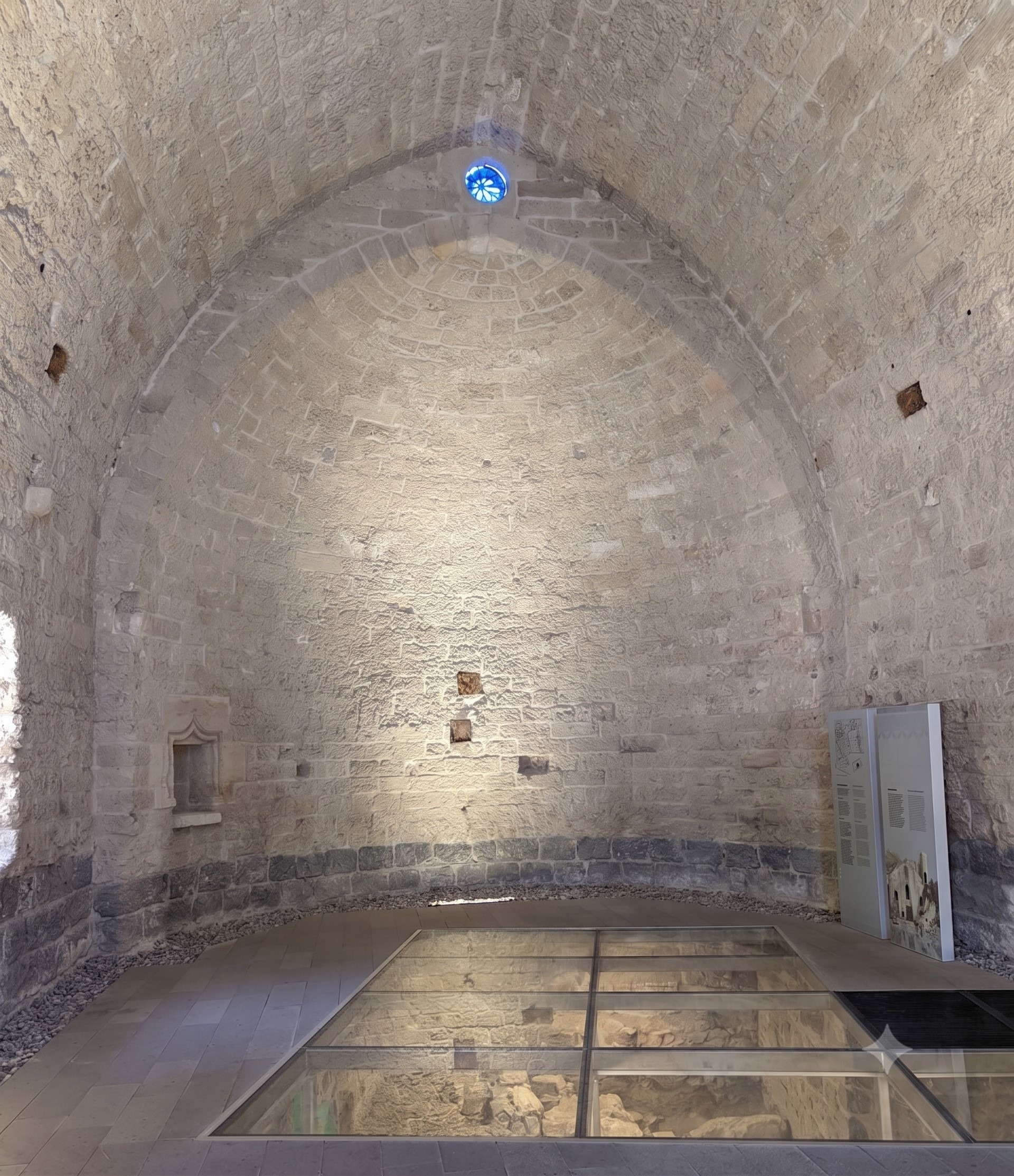 Stone building interior with excavated floor