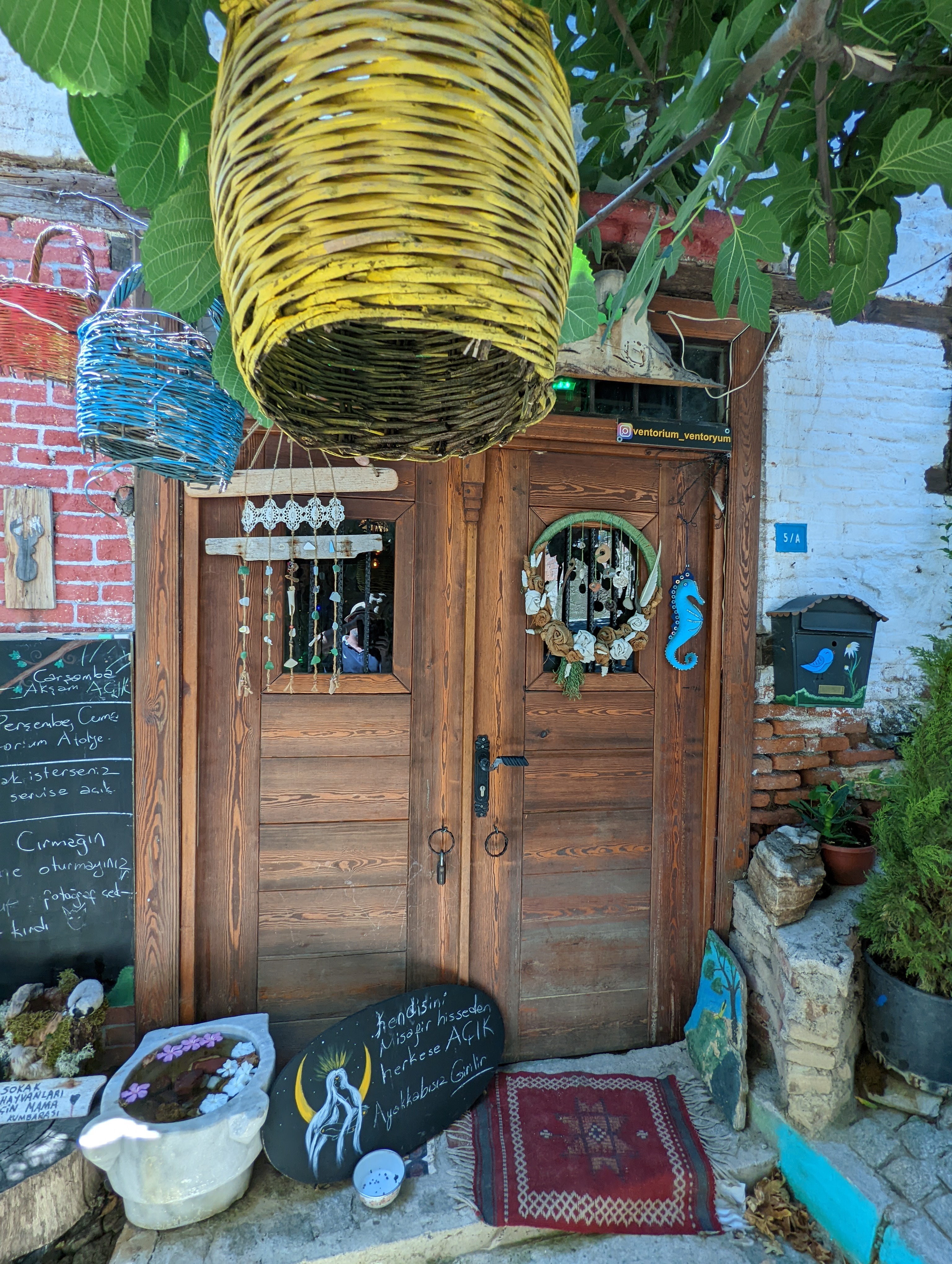 Shells and baskets adorn a door