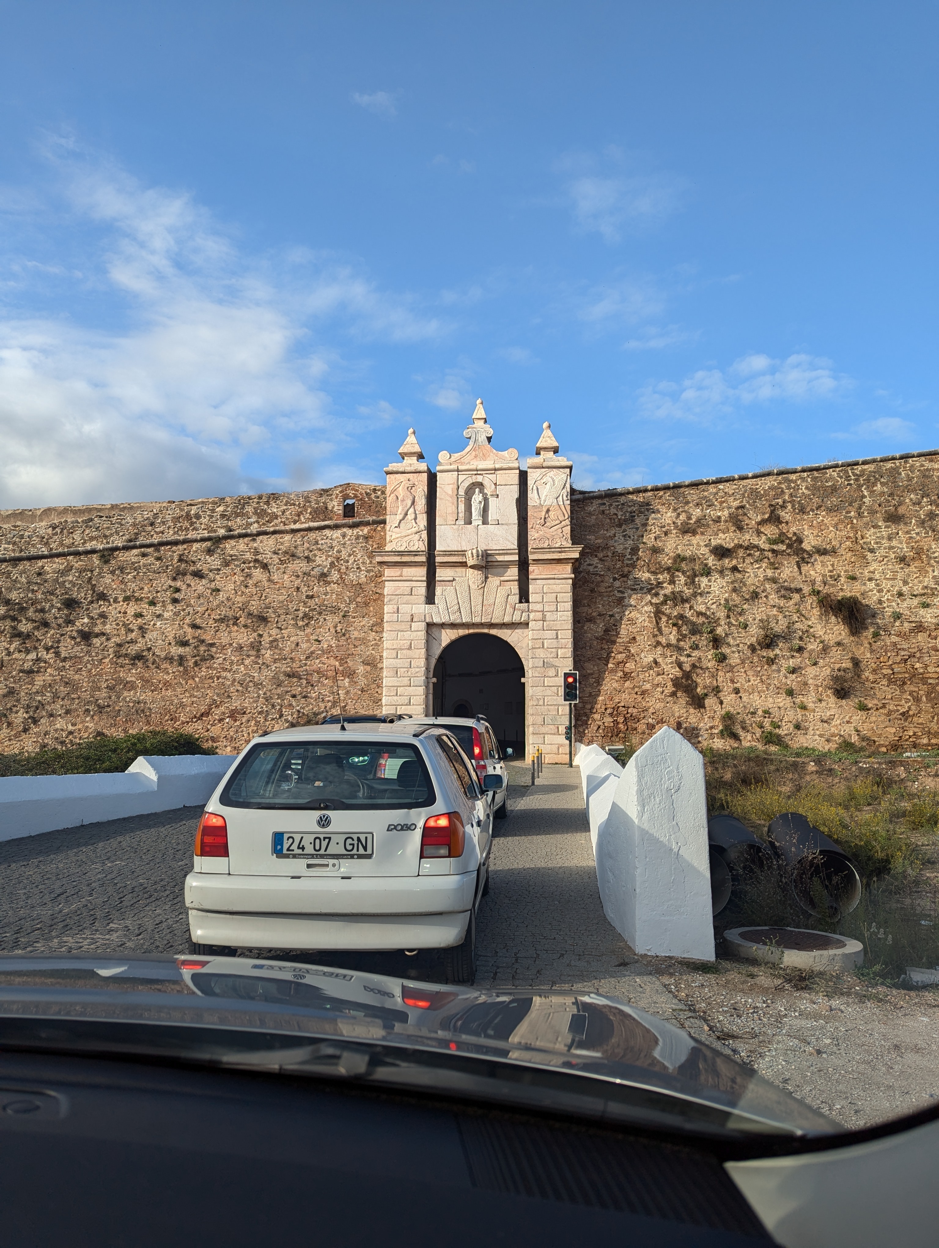 Cars waiting to pass the single-lane tunnel through the city wall