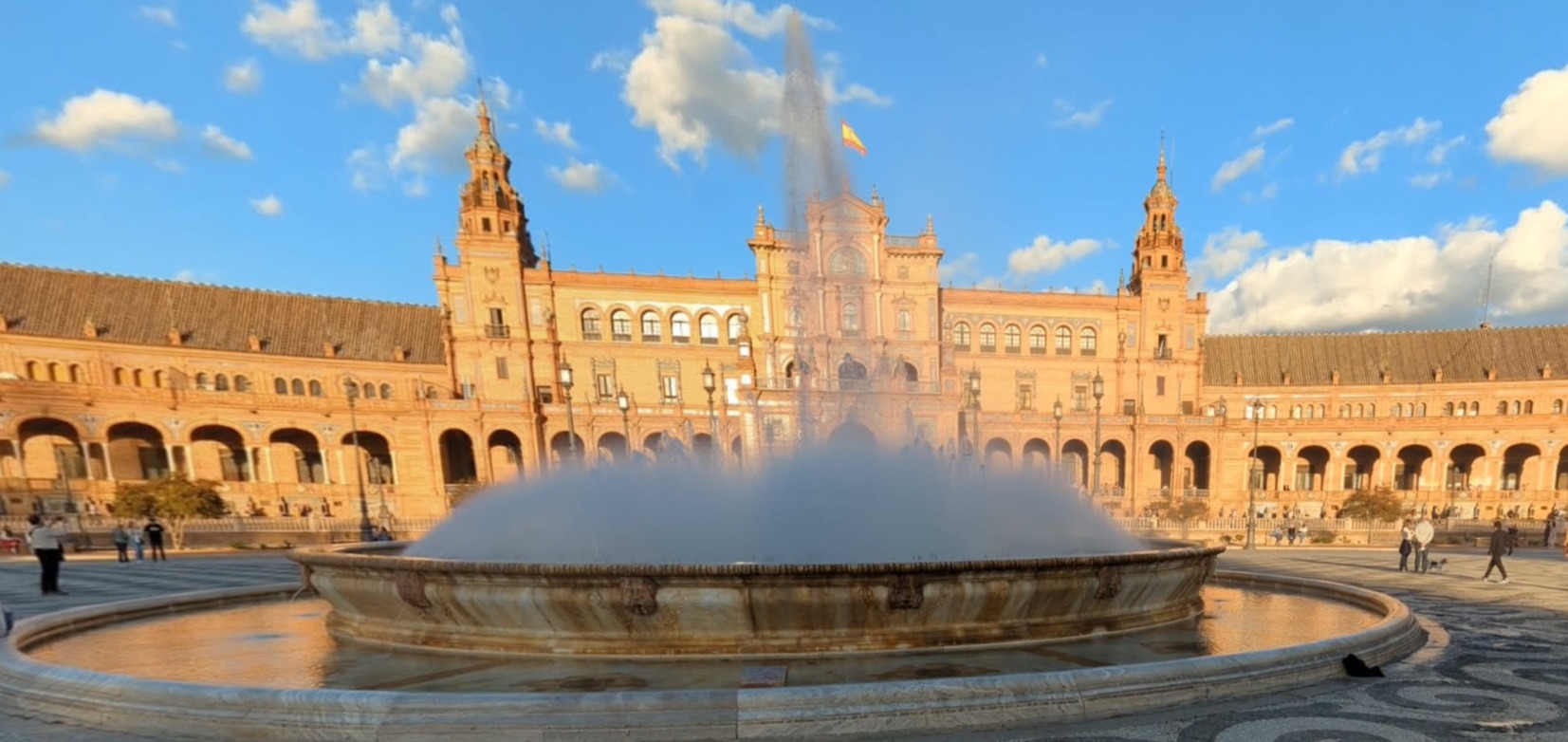 Plaza de España central fountain at golden hour