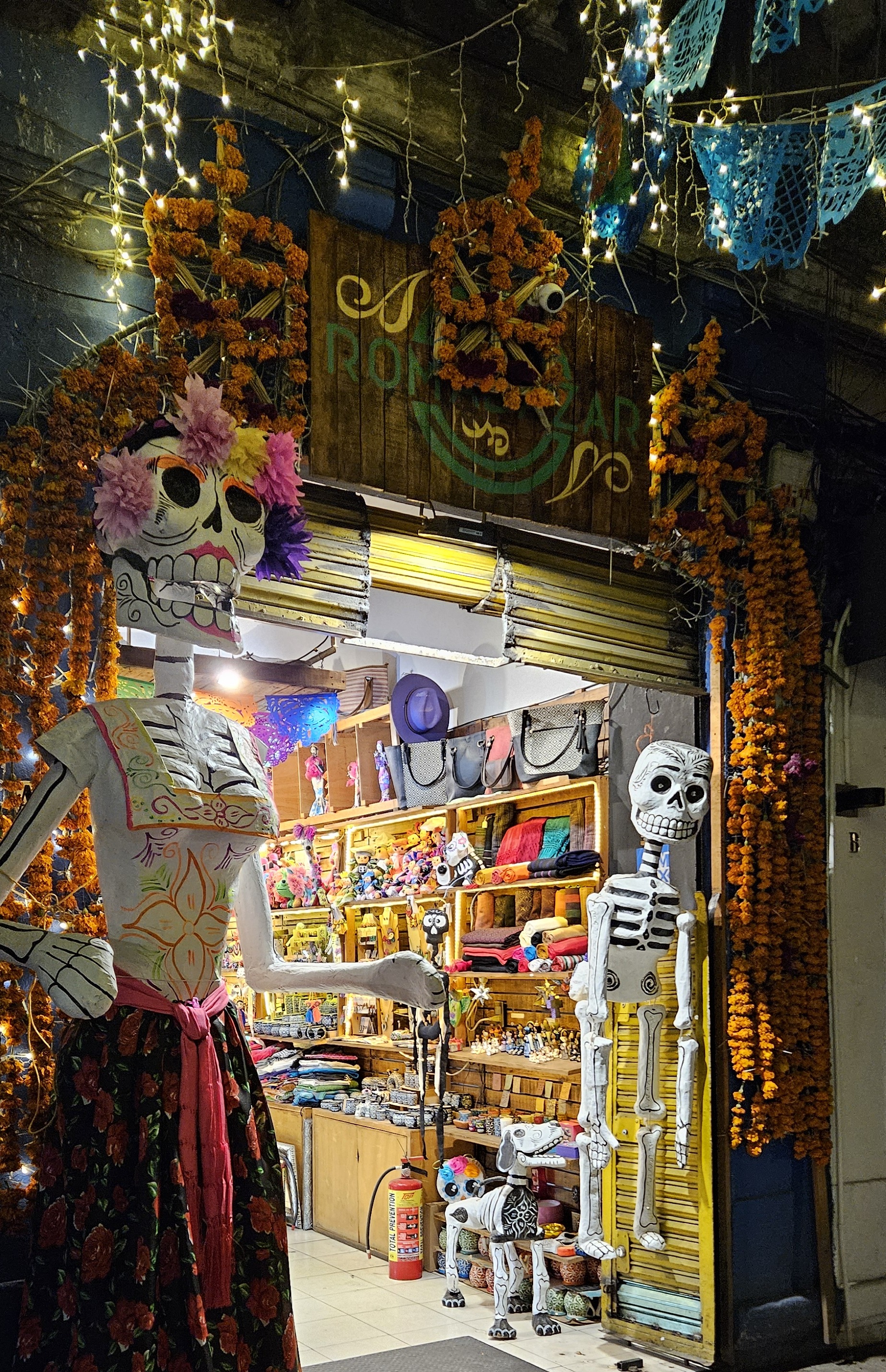 A shop still decorated for Día de los Muertos