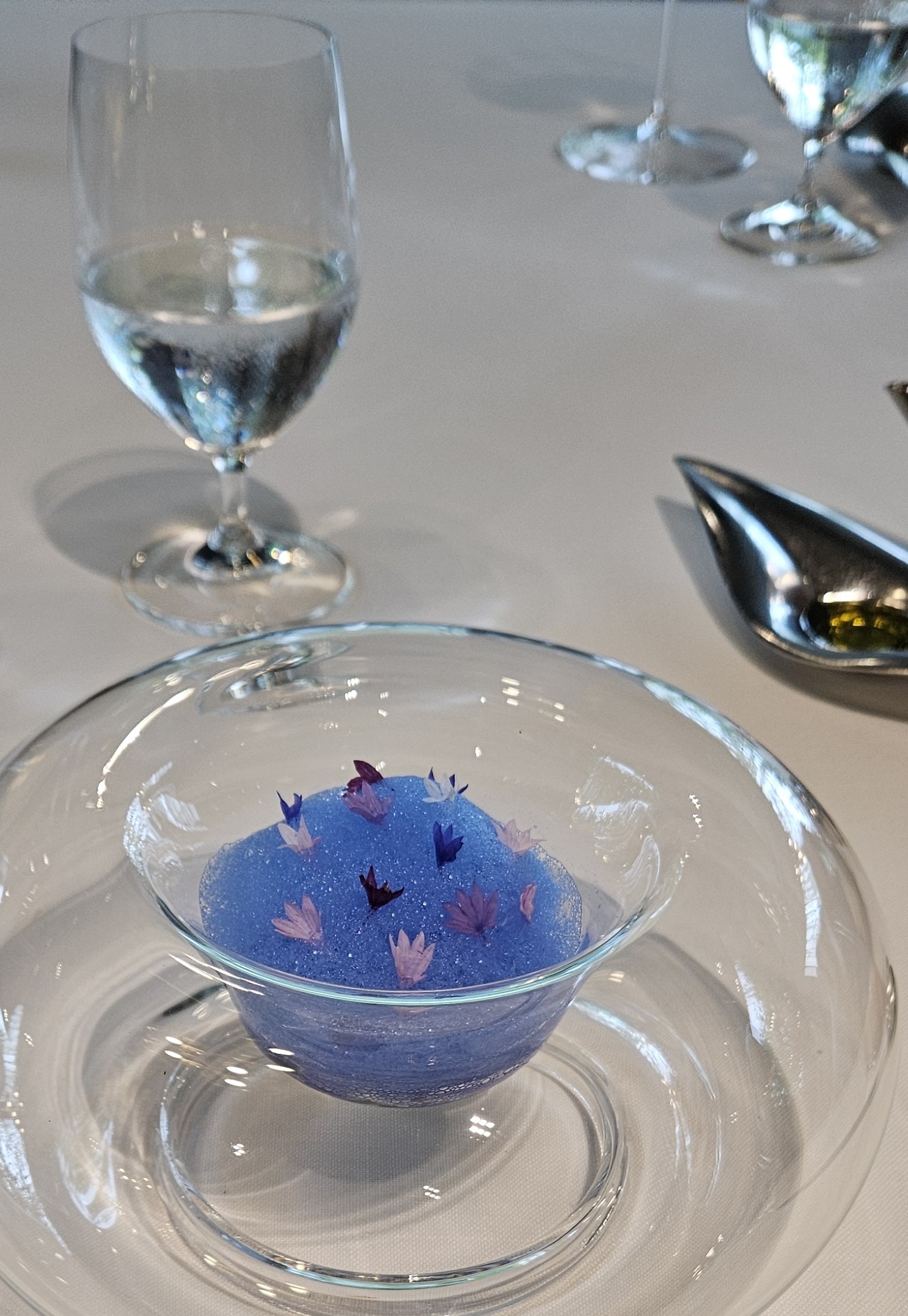 Blue foam with flowers and crab