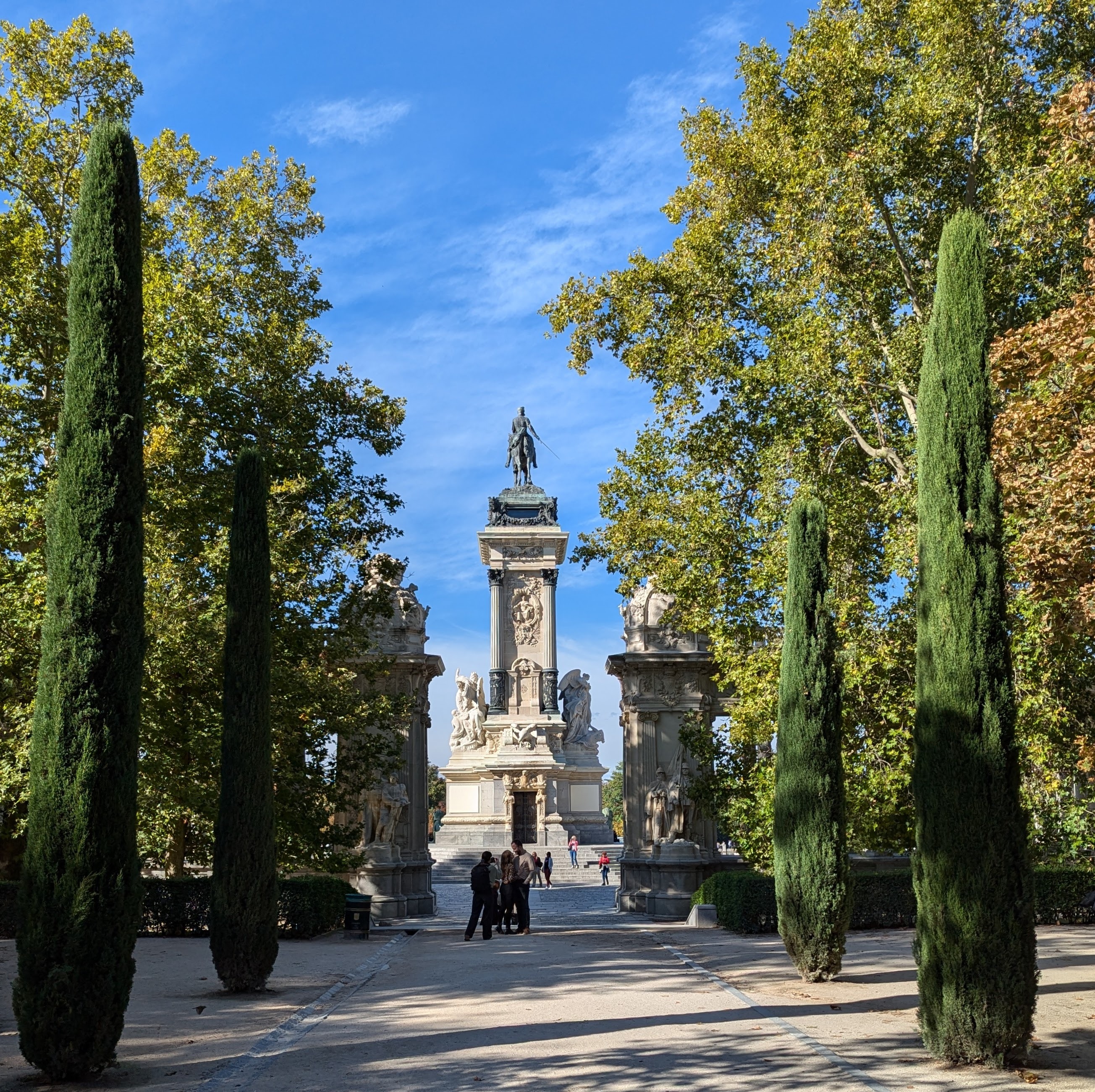 Monument at end of cypress colonnade