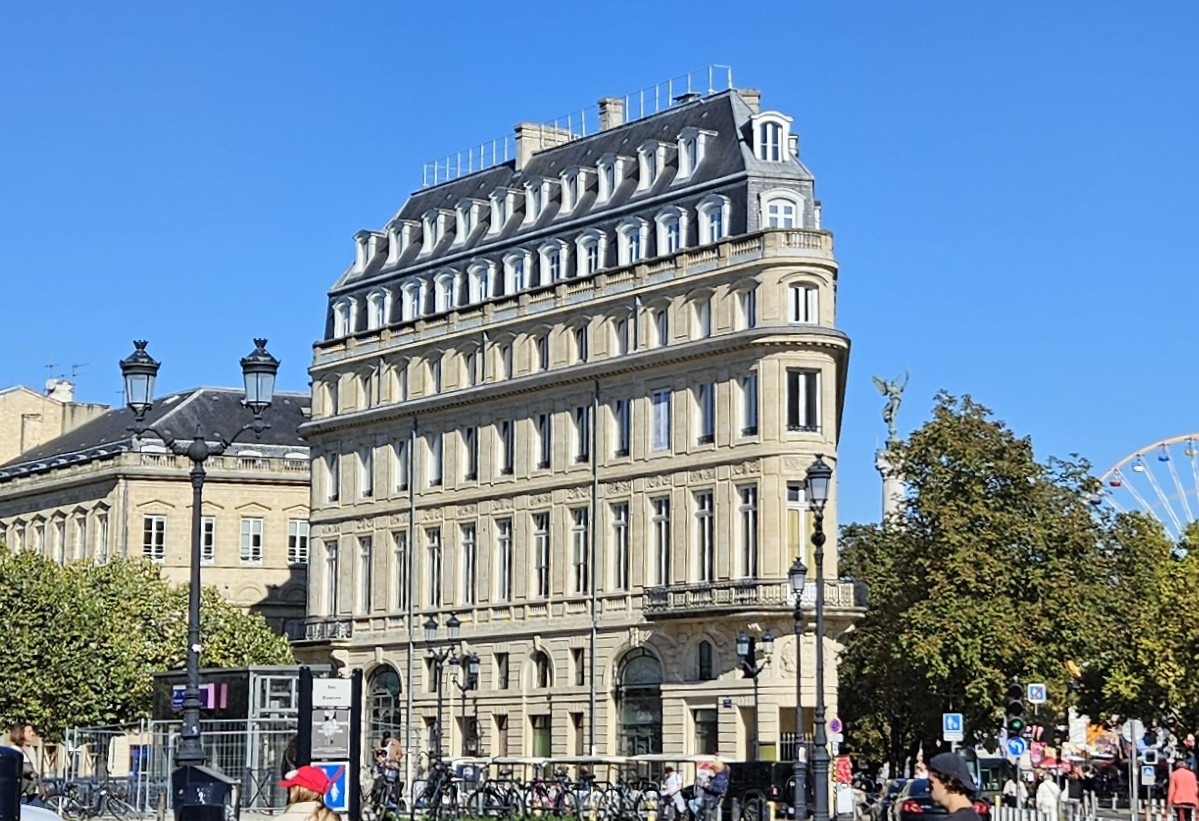 A flat-iron type building