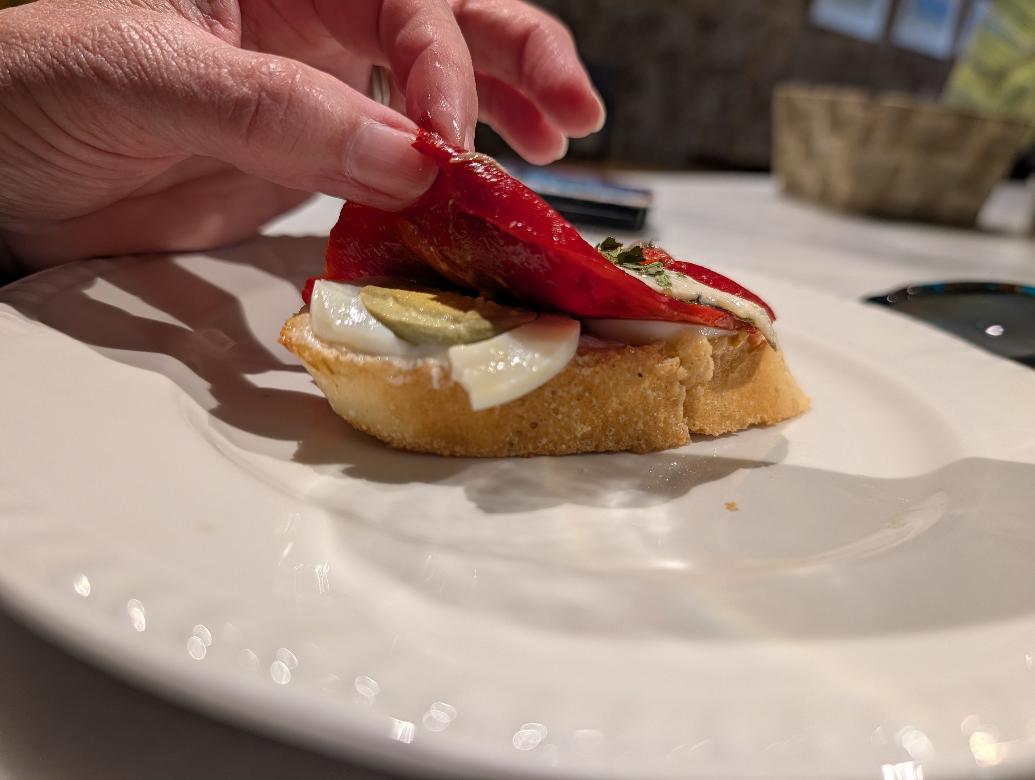Pinxto with roasted red pepper and boiled egg
