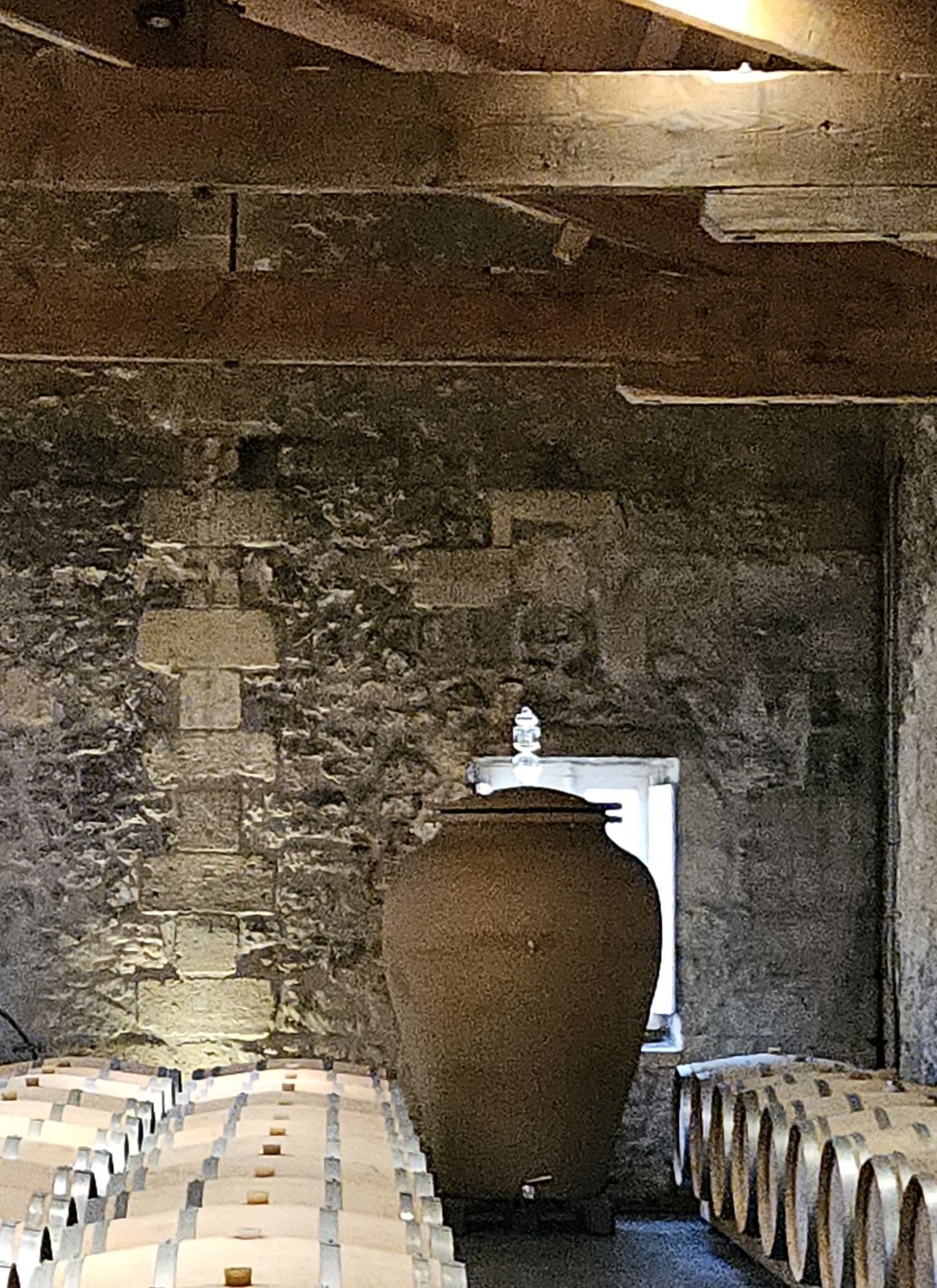 Wine barrels and concrete urn