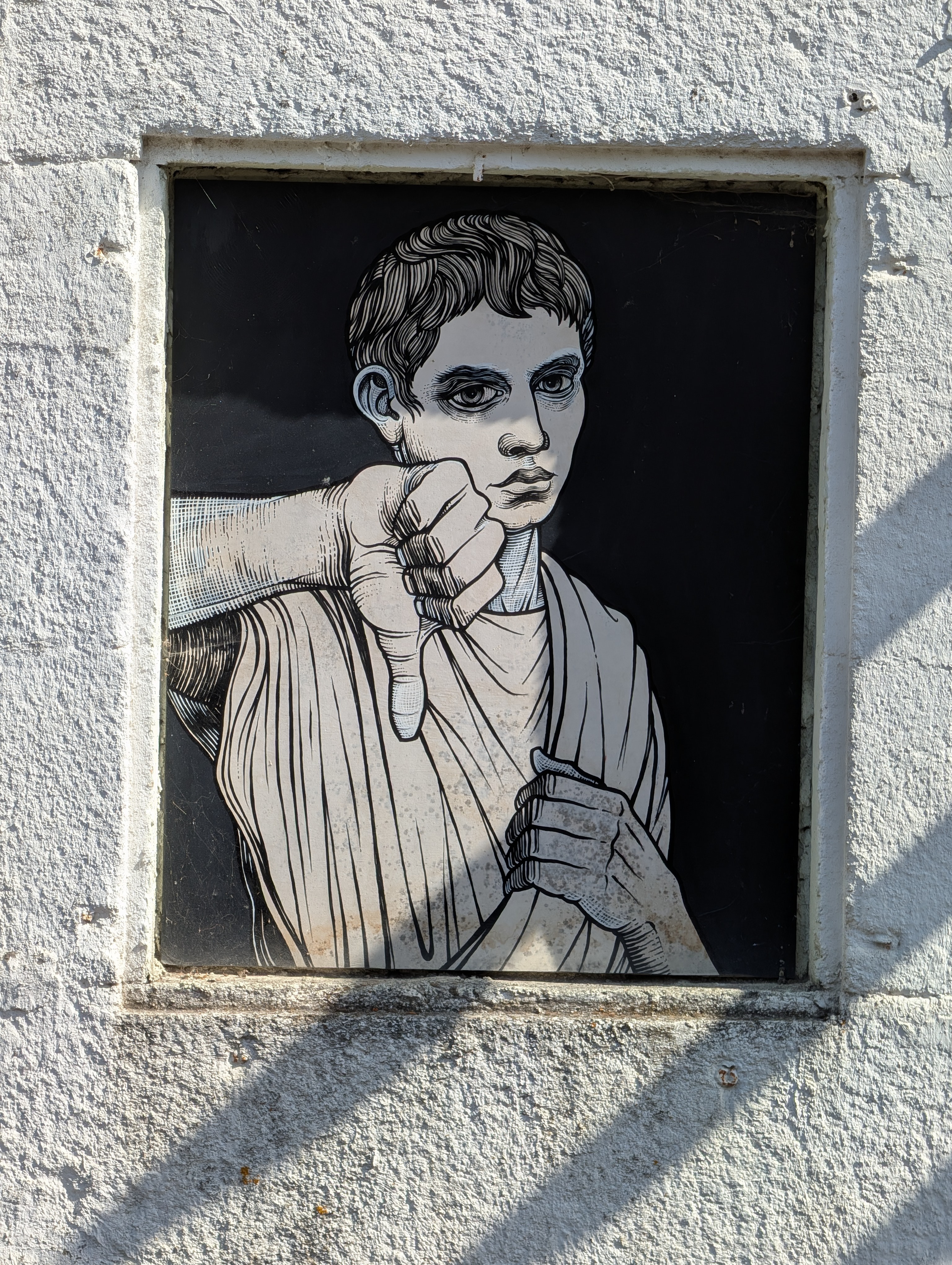 Mural of Roman giving a thumbs-down, in Lugo