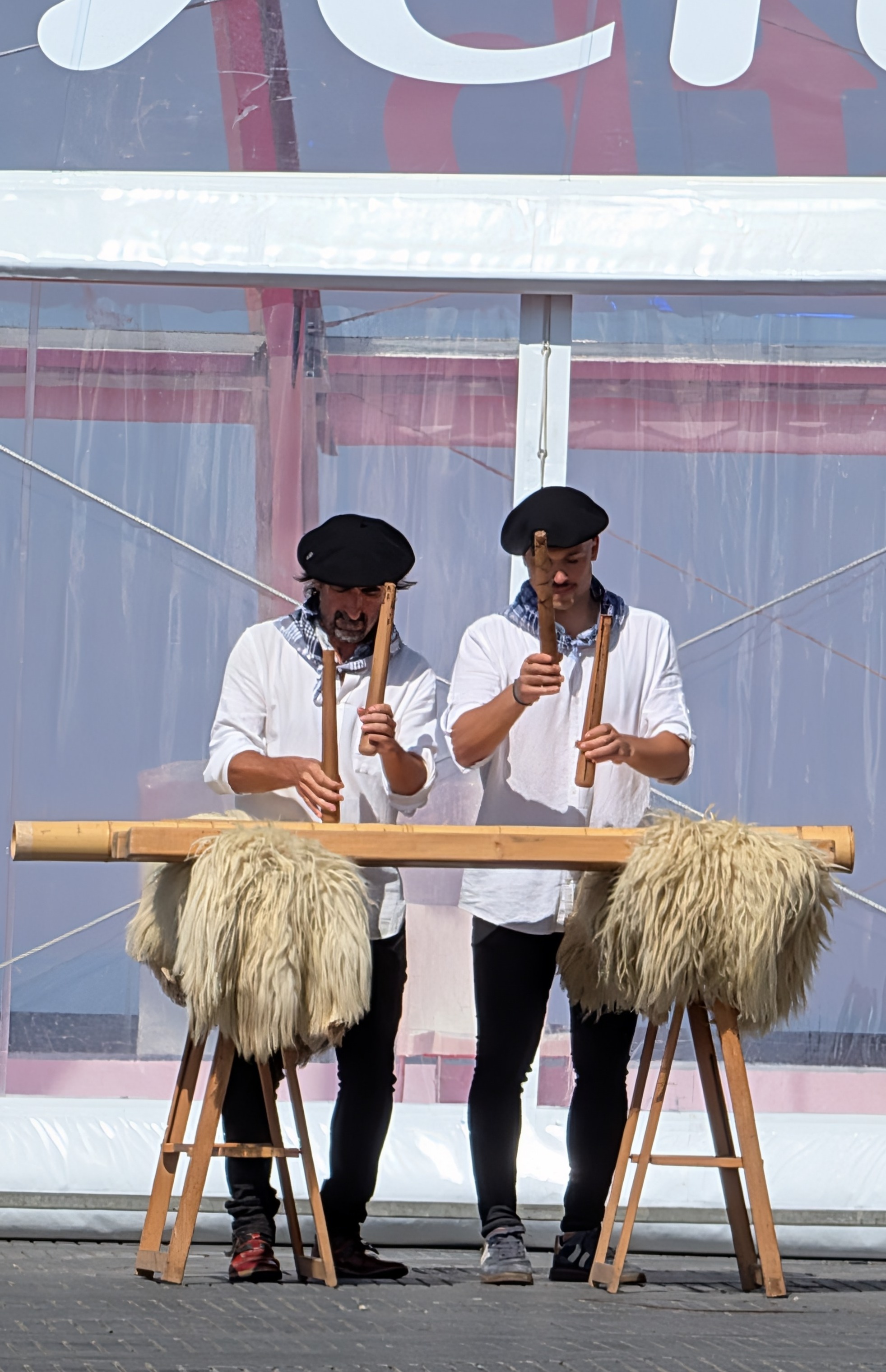 Street performers playing a txalaparta traditional Basque instrument