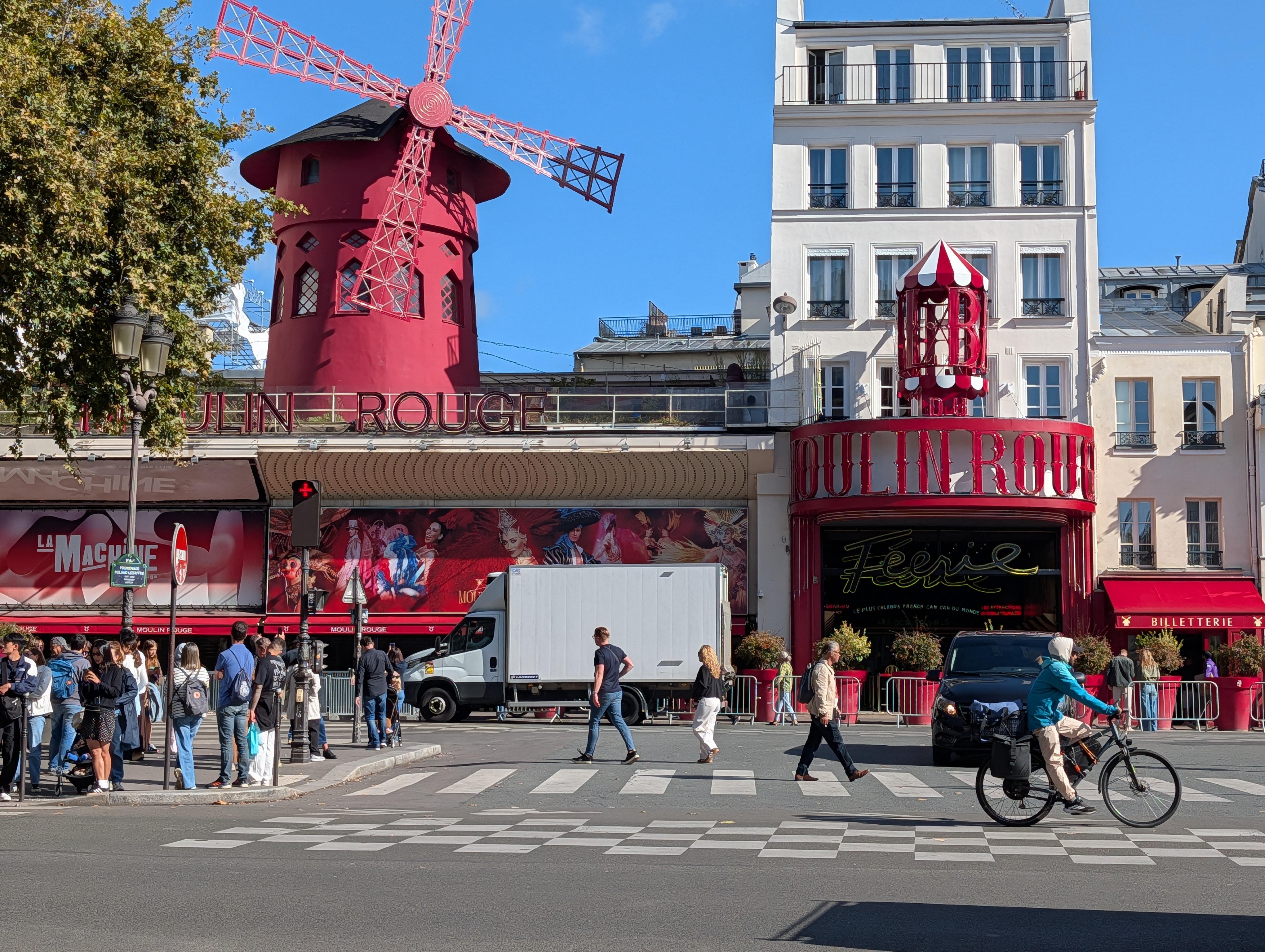 In front of the Moulin Rouge