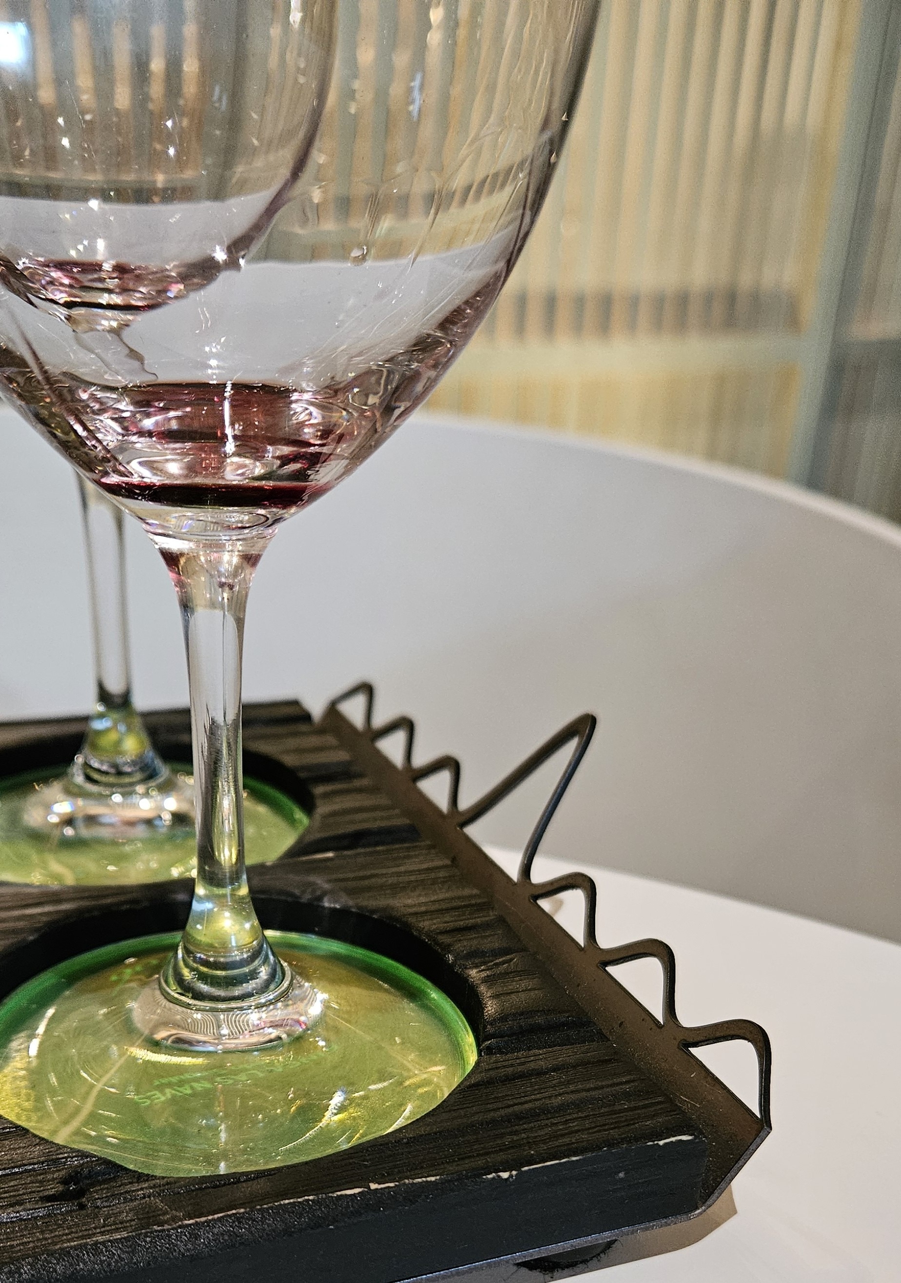 Ysios tray handle echoes the roofline