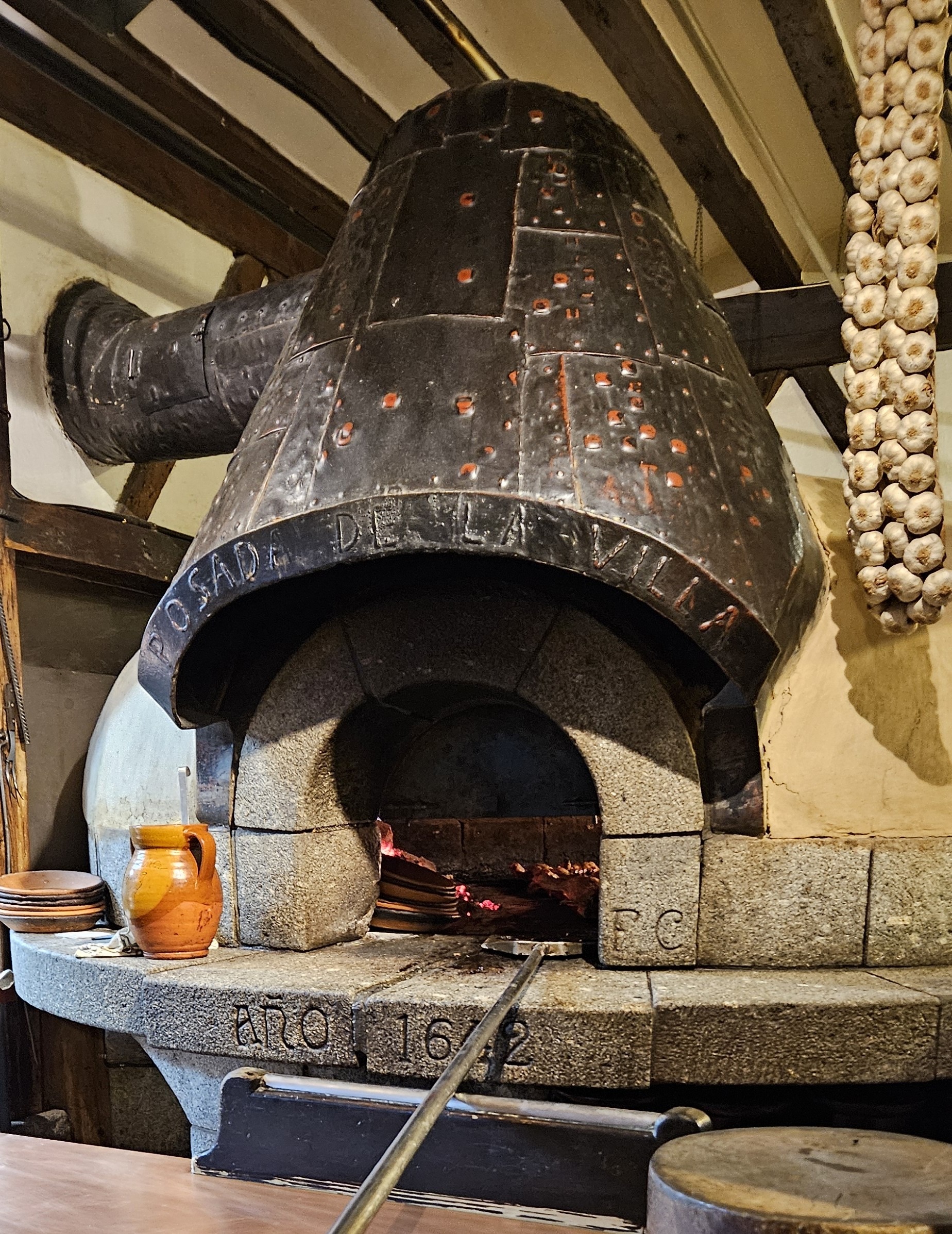 Posada de la Villa's wood-fired oven, inscribed 1642