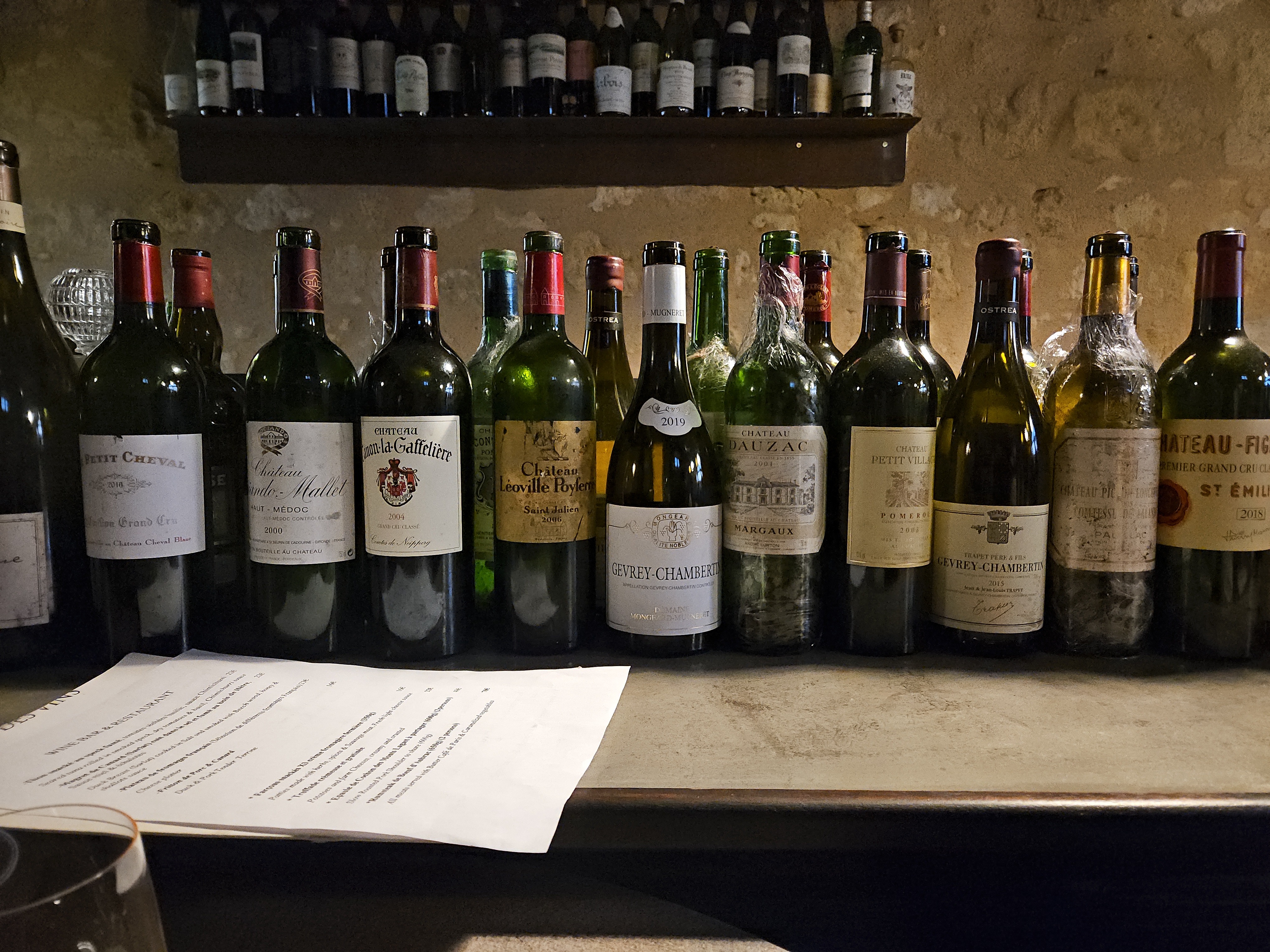 Lineup of Bordeaux wine bottles