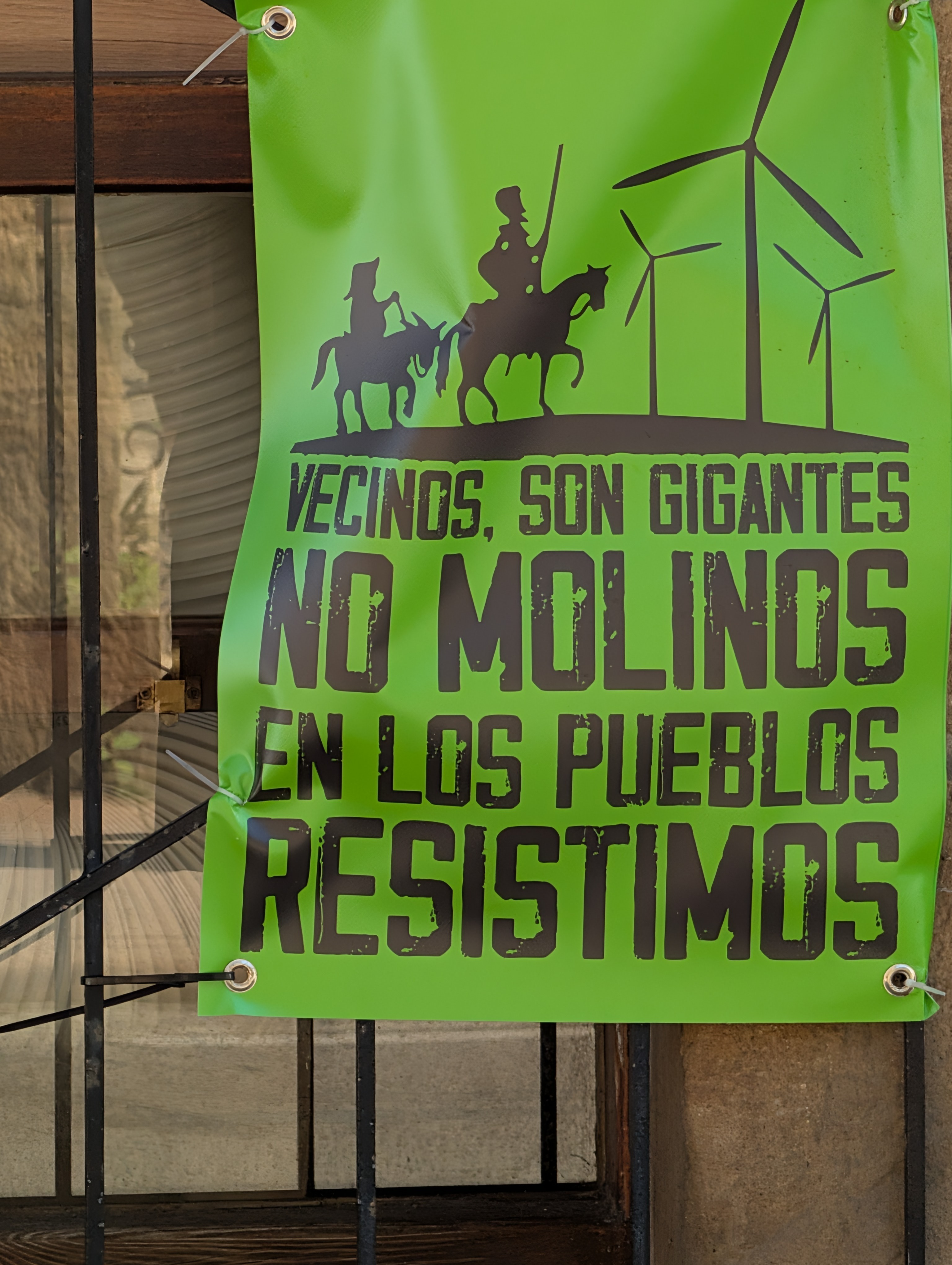 Sign encouraging a vote against windmill construction