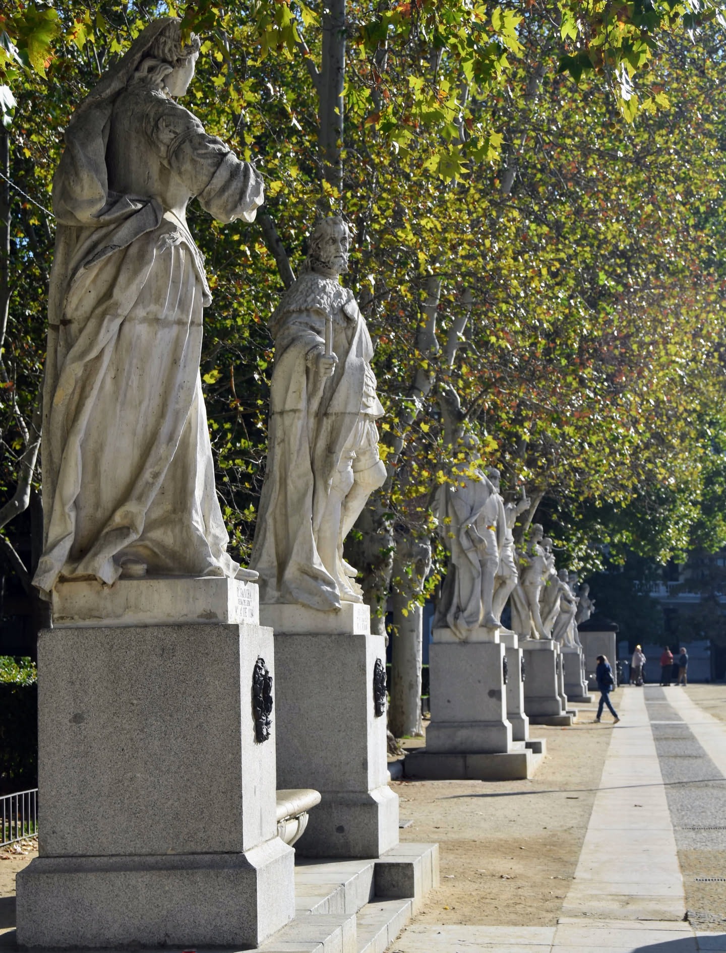 Plaza de Oriente walk lined with statues