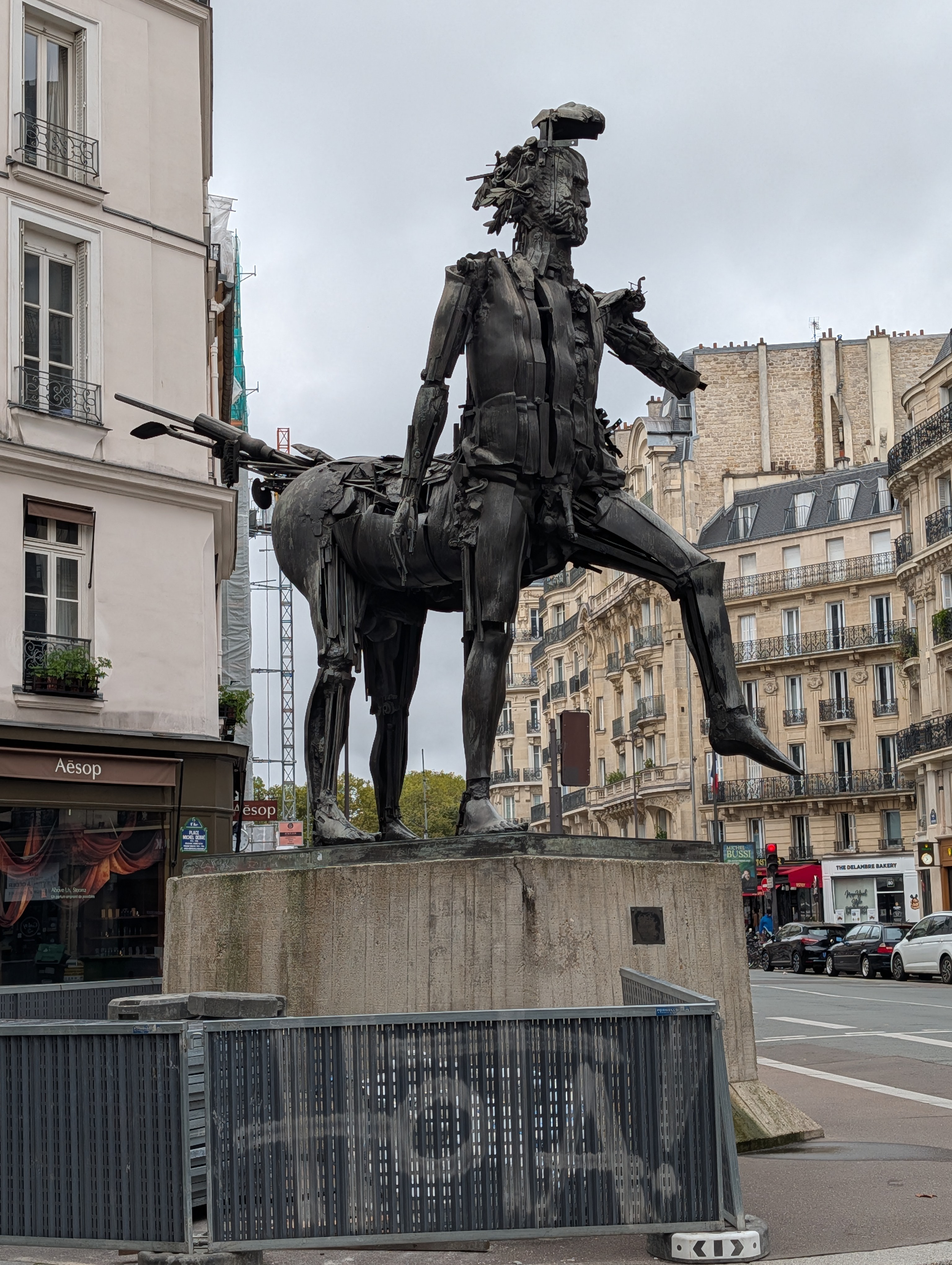 Metal sculpture of an almost-centaur